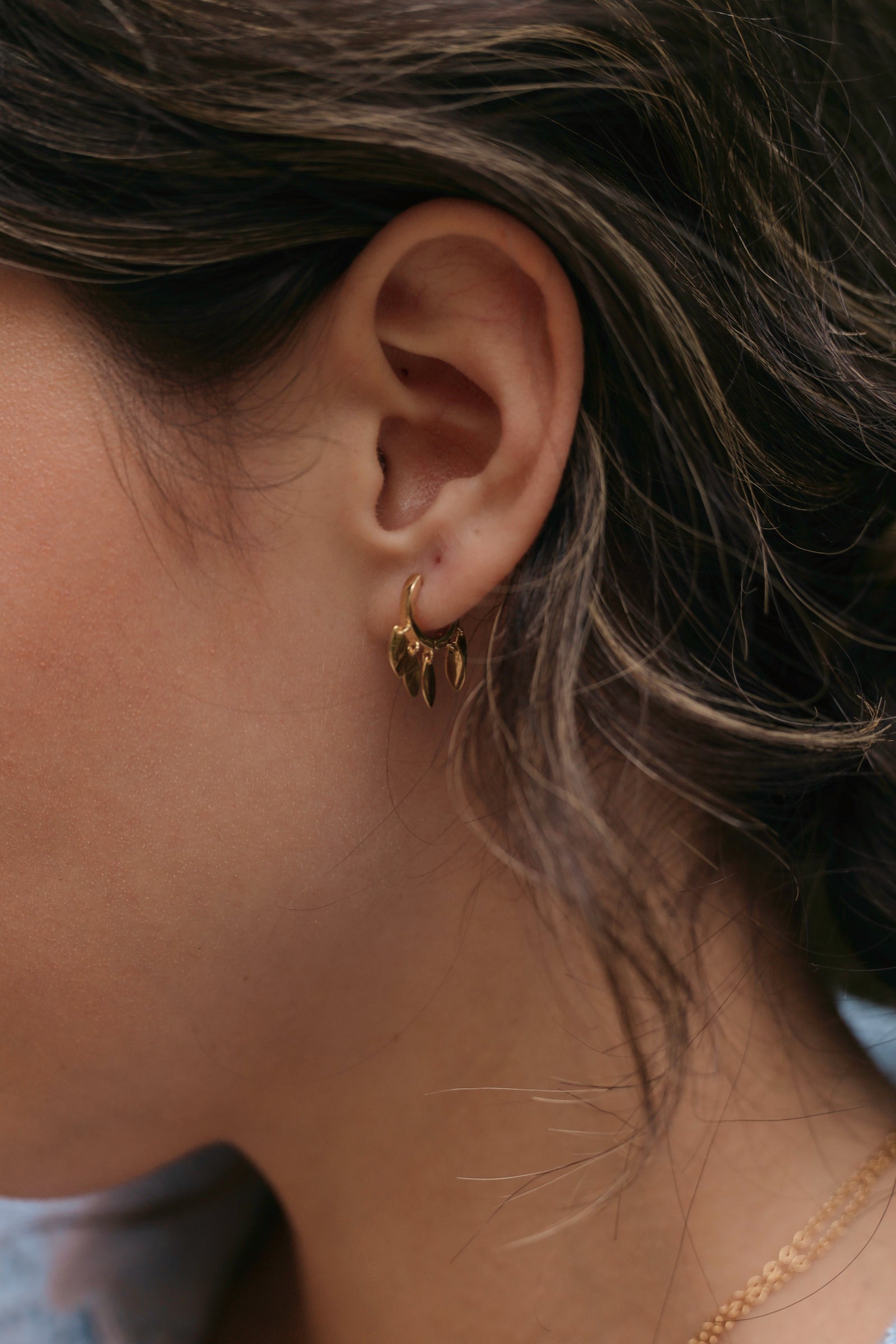 gold flower petal hoop earrings